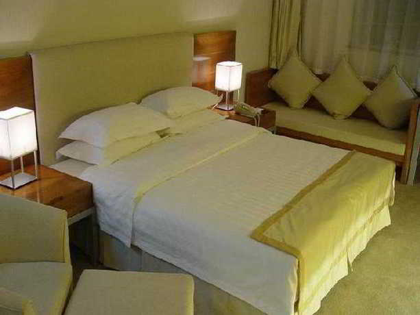 Imagen de la habitación del Hotel Holiday Garden. Foto 3