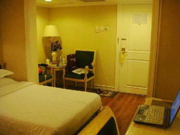 Imagen de la habitación del Hotel Holiday Garden. Foto 5
