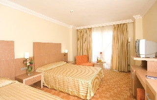 Imagen de la habitación del Hotel Holiday Garden Resort, Okurcalar. Foto 9