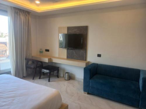 Imagen de la habitación del Hotel Holiday Grand. Foto 19