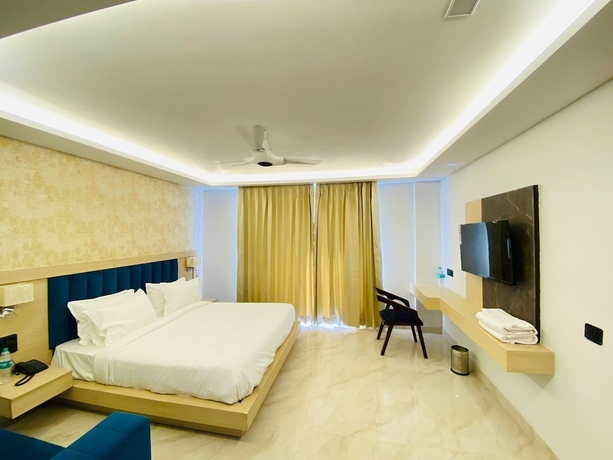 Imagen de la habitación del Hotel Holiday Grand Near Expo Mart. Foto 2