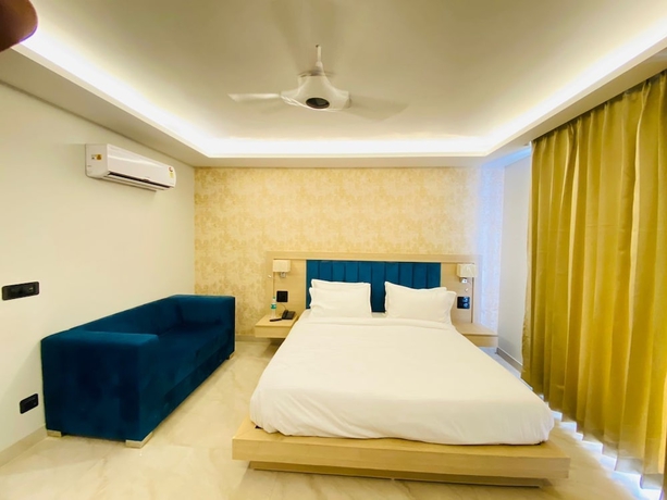 Imagen de la habitación del Hotel Holiday Grand Near Expo Mart. Foto 5