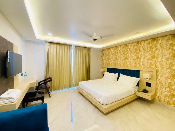 Imagen de la habitación del Hotel Holiday Grand Near Expo Mart. Foto 7