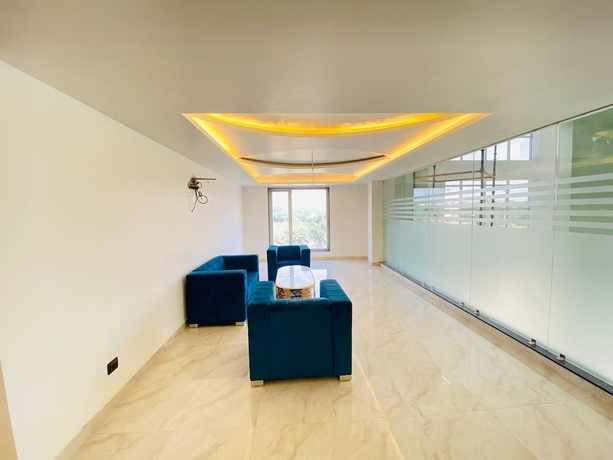 Imagen de la habitación del Hotel Holiday Grand Near Expo Mart. Foto 11