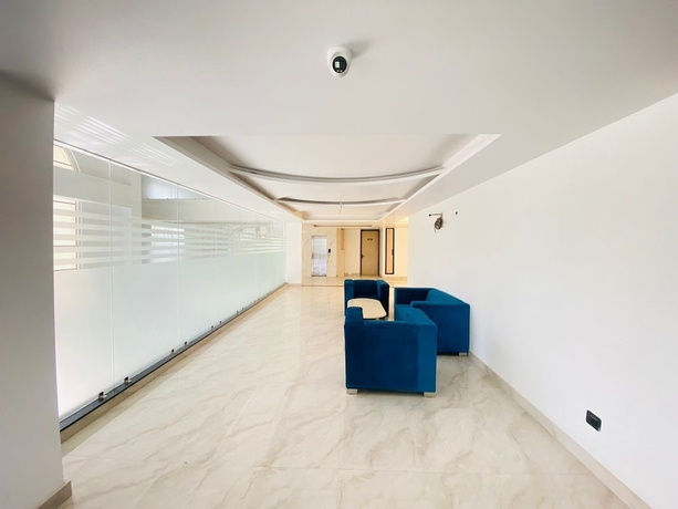 Imagen de la habitación del Hotel Holiday Grand Near Expo Mart. Foto 13