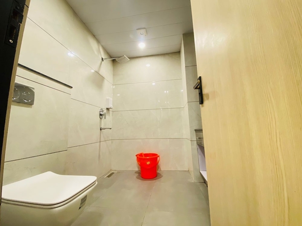 Imagen de la habitación del Hotel Holiday Grand Near Expo Mart. Foto 15