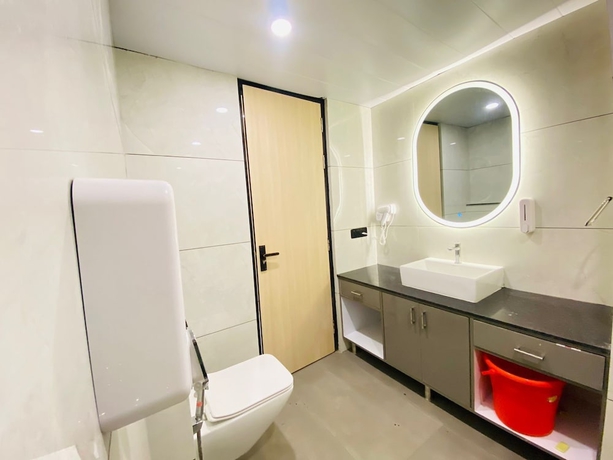 Imagen de la habitación del Hotel Holiday Grand Near Expo Mart. Foto 16