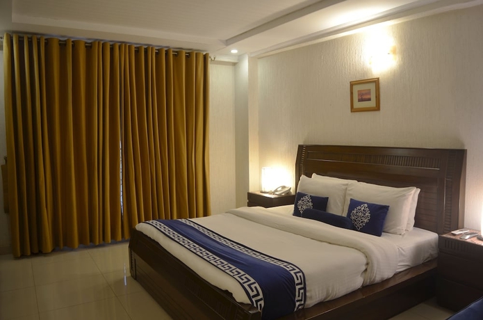 Imagen de la habitación del Hotel Holiday Grand Resort Bhurban. Foto 5