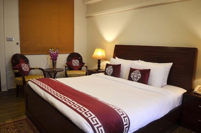 Imagen de la habitación del Hotel Holiday Grand Resort Bhurban. Foto 7