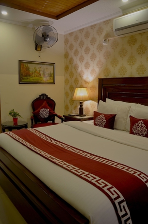 Imagen de la habitación del Hotel Holiday Grand Resort Bhurban. Foto 12