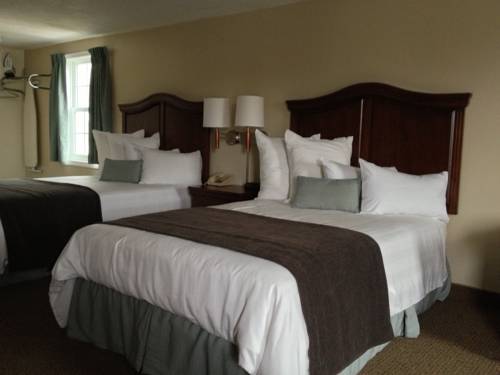 Imagen de la habitación del Hotel Holiday Hill Inn and Suites. Foto 5