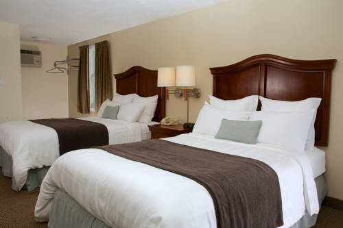 Imagen de la habitación del Hotel Holiday Hill Inn and Suites. Foto 13