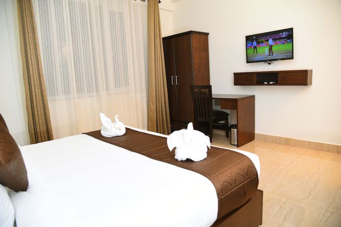 Imagen de la habitación del Hotel Holiday Hill, Rishikesh. Foto 4