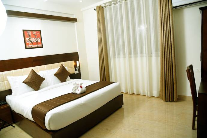 Imagen de la habitación del Hotel Holiday Hill, Rishikesh. Foto 5