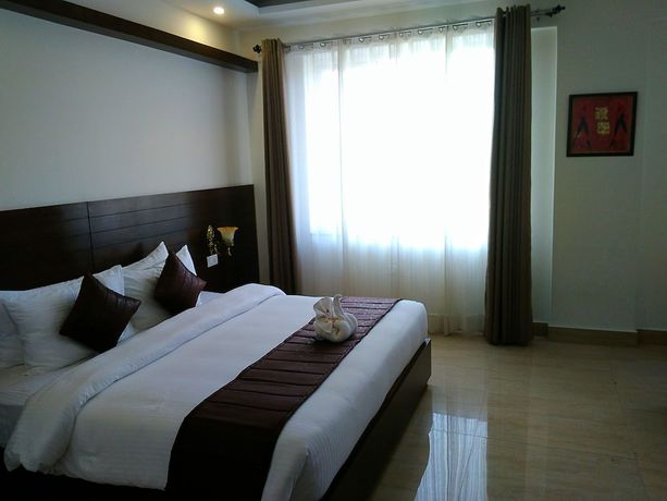 Imagen de la habitación del Hotel Holiday Hill, Rishikesh. Foto 12