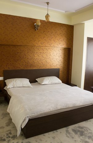 Imagen de la habitación del Hotel Holiday Home, JAIPUR. Foto 7