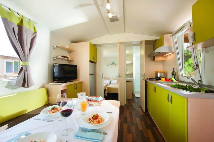 Imagen de la habitación del Hotel Holiday Homes Sirena Classic. Foto 8