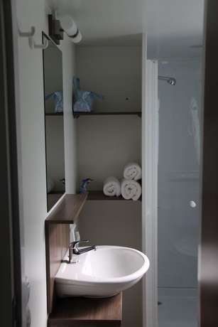 Imagen de la habitación del Hotel Holiday Homes Sirena Classic. Foto 10