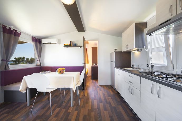 Imagen de la habitación del Hotel Holiday Homes Sirena Premium Village. Foto 2