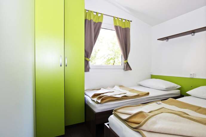 Imagen de la habitación del Hotel Holiday Homes Sirena Premium Village. Foto 4