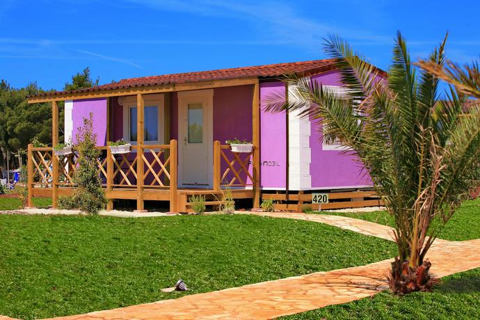 Imagen de la habitación del Hotel Holiday Homes Sirena Premium Village. Foto 8