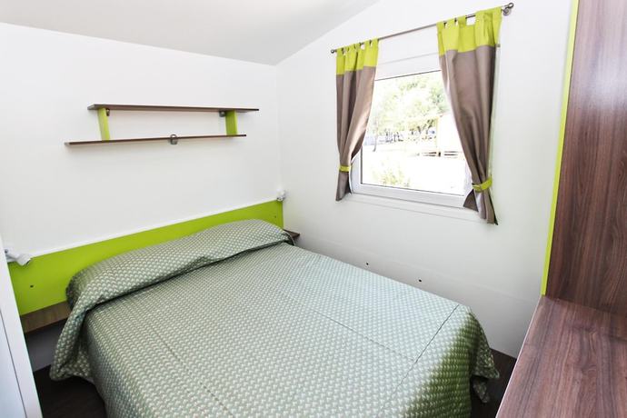 Imagen de la habitación del Hotel Holiday Homes Sirena Premium Village. Foto 9
