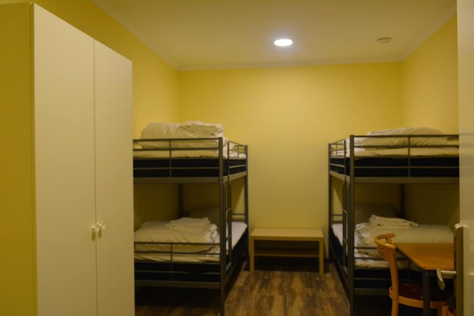 Imagen de la habitación del Hotel Holiday Hostel. Foto 15