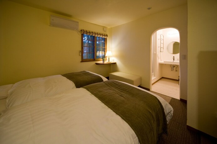 Imagen de la habitación del Hotel Holiday House Green Garden. Foto 15