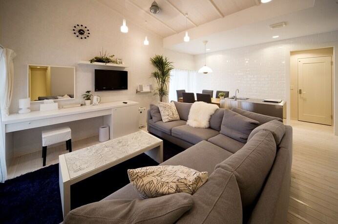 Imagen de la habitación del Hotel Holiday House Green Garden. Foto 19