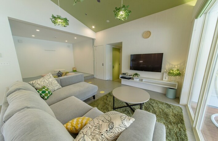 Imagen de la habitación del Hotel Holiday House Green Garden. Foto 22
