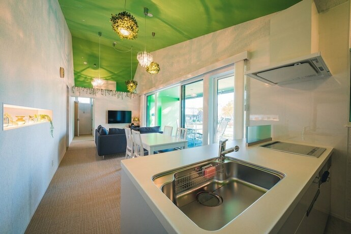 Imagen de la habitación del Hotel Holiday House Green Garden. Foto 27