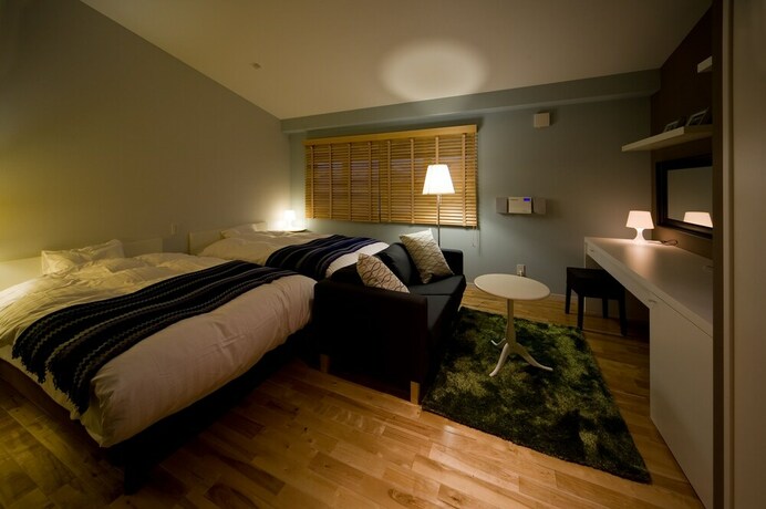 Imagen de la habitación del Hotel Holiday House Green Garden. Foto 32