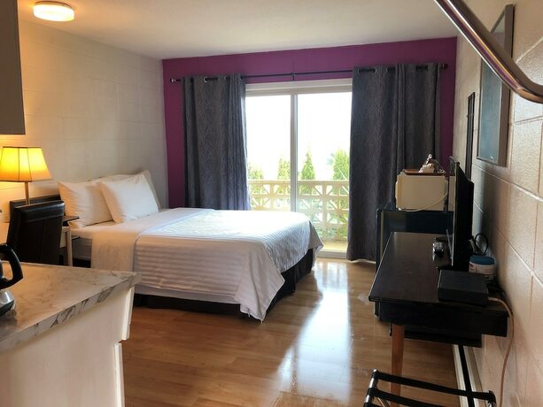 Imagen de la habitación del Hotel Holiday House Motel. Foto 17