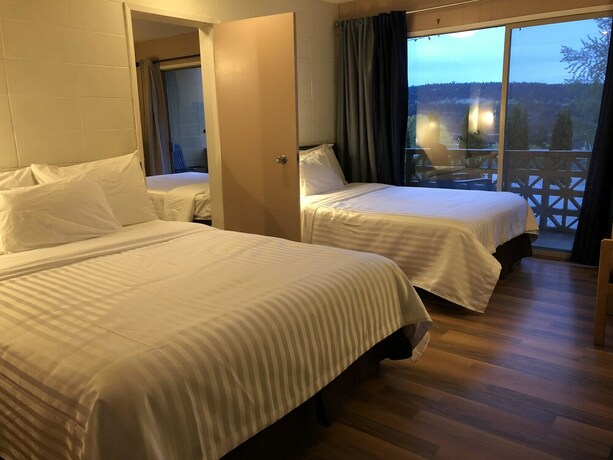 Imagen de la habitación del Hotel Holiday House Motel. Foto 19