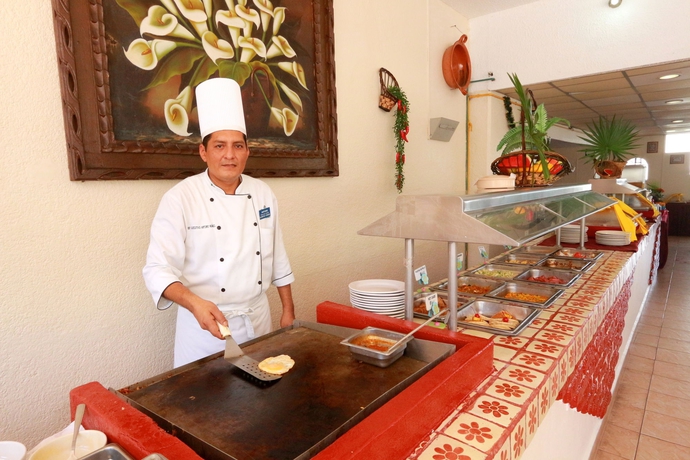 Imagen del bar/restaurante del Hotel Holiday Inn Acapulco Amarea By Ihg. Foto 2