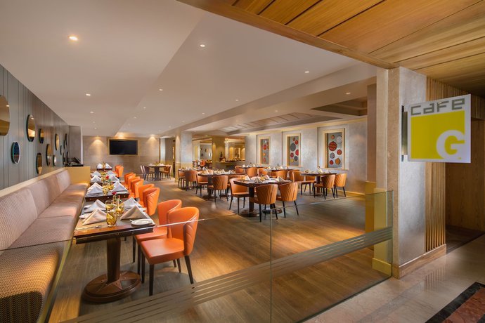 Imagen del bar/restaurante del Hotel Holiday Inn Agra MG Road, an IHG Hotel. Foto 2