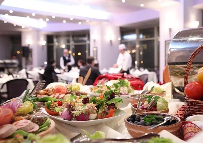 Imagen del bar/restaurante del Hotel Holiday Inn Bucharest - Times, An Ihg. Foto 9