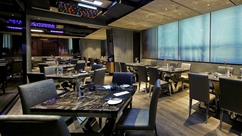 Imagen del bar/restaurante del Hotel Holiday Inn City Centre Harbin. Foto 4