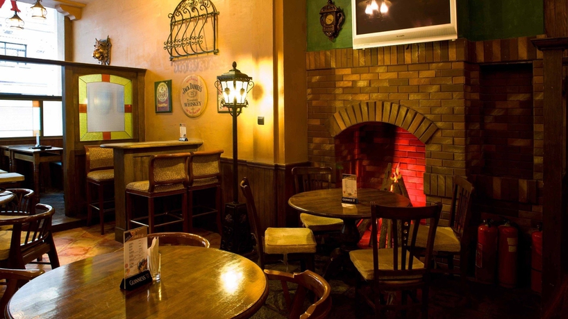 Imagen del bar/restaurante del Hotel Holiday Inn City Centre Harbin. Foto 6