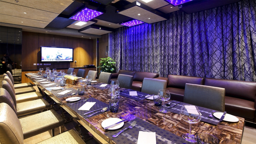 Imagen del bar/restaurante del Hotel Holiday Inn City Centre Harbin. Foto 7