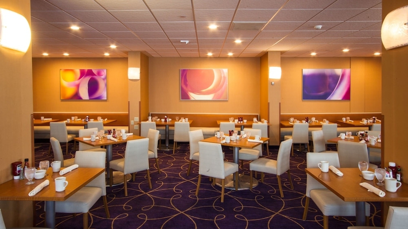 Imagen del bar/restaurante del Hotel Holiday Inn Downtown Rochester. Foto 3