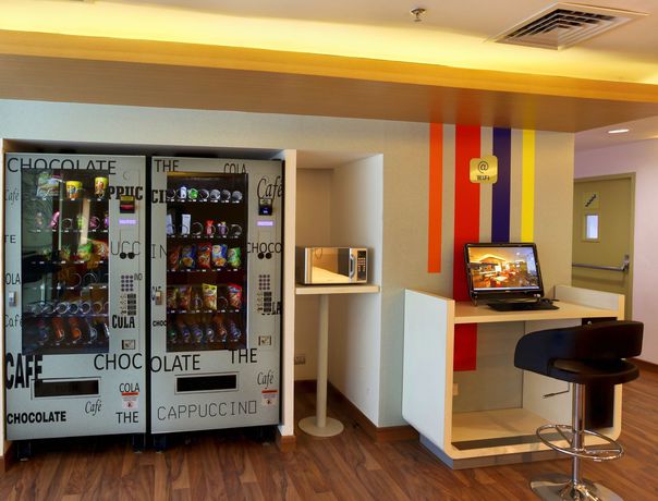 Imagen del bar/restaurante del Hotel Holiday Inn Express Ahmdabad Prahlad Nagar, An Ihg. Foto 5