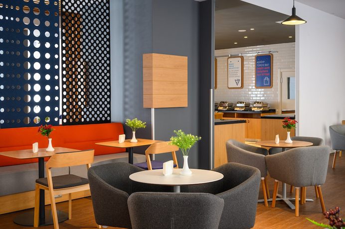 Imagen del bar/restaurante del Hotel Holiday Inn Express Almaty, An Ihg. Foto 5