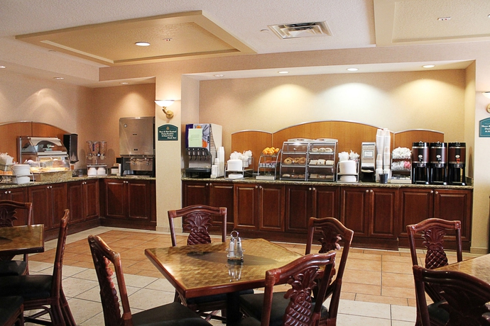 Imagen del bar/restaurante del Hotel Holiday Inn Express And Suites Clermont Se West Orlando by IHG. Foto 4