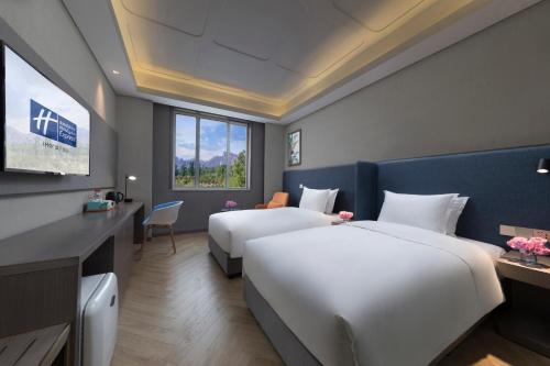 Imagen de la habitación del Hotel Holiday Inn Express Beijing Badaling. Foto 2