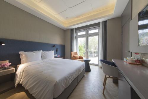 Imagen de la habitación del Hotel Holiday Inn Express Beijing Badaling. Foto 8