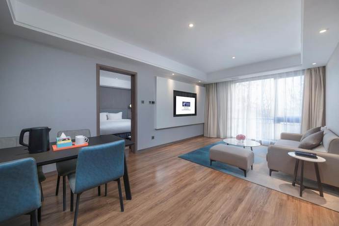 Imagen de la habitación del Hotel Holiday Inn Express Beijing Shijingshan Lakeview. Foto 13