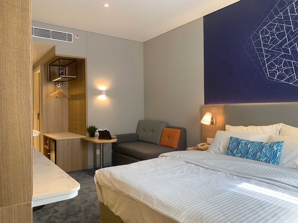 Imagen de la habitación del Hotel Holiday Inn Express Bengaluru Bommasandra. Foto 7