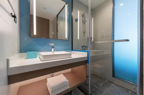 Imagen de la habitación del Hotel Holiday Inn Express Changfeng Park. Foto 13