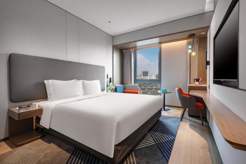 Imagen de la habitación del Hotel Holiday Inn Express Changfeng Park. Foto 15